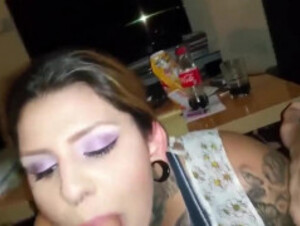 Tattooed slut eats cock